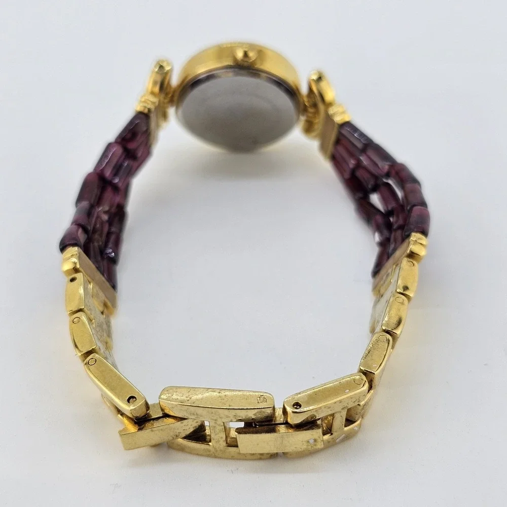 Women's Analog Watch‎ 25MM Light Yellow Dial Gold Purple Bands 6.75